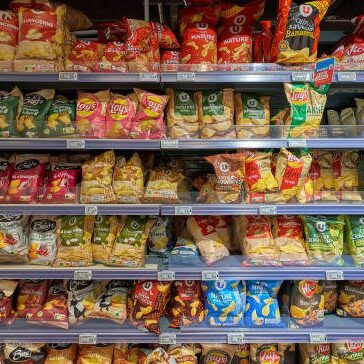 Colorful shelves in a supermarket with many products